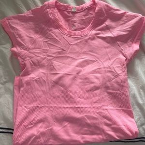 RARE  MIAMI PINK LIGHT NEON PINK LULULEMON SWIFTLY TECH SHORT SLEEVE TOP. size 4